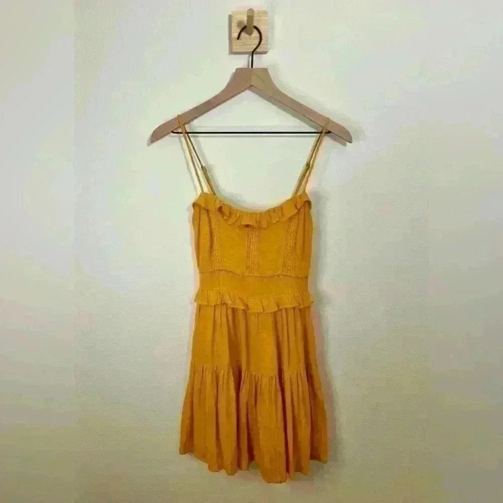 All In Favor Sweet tiered, flowy dress with ruffled details. Size Small